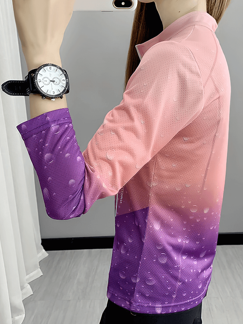 Woman wears a long-sleeved stand-up collar loose ice silk top with a purple and pink gradient print, ideal for stylish comfort.